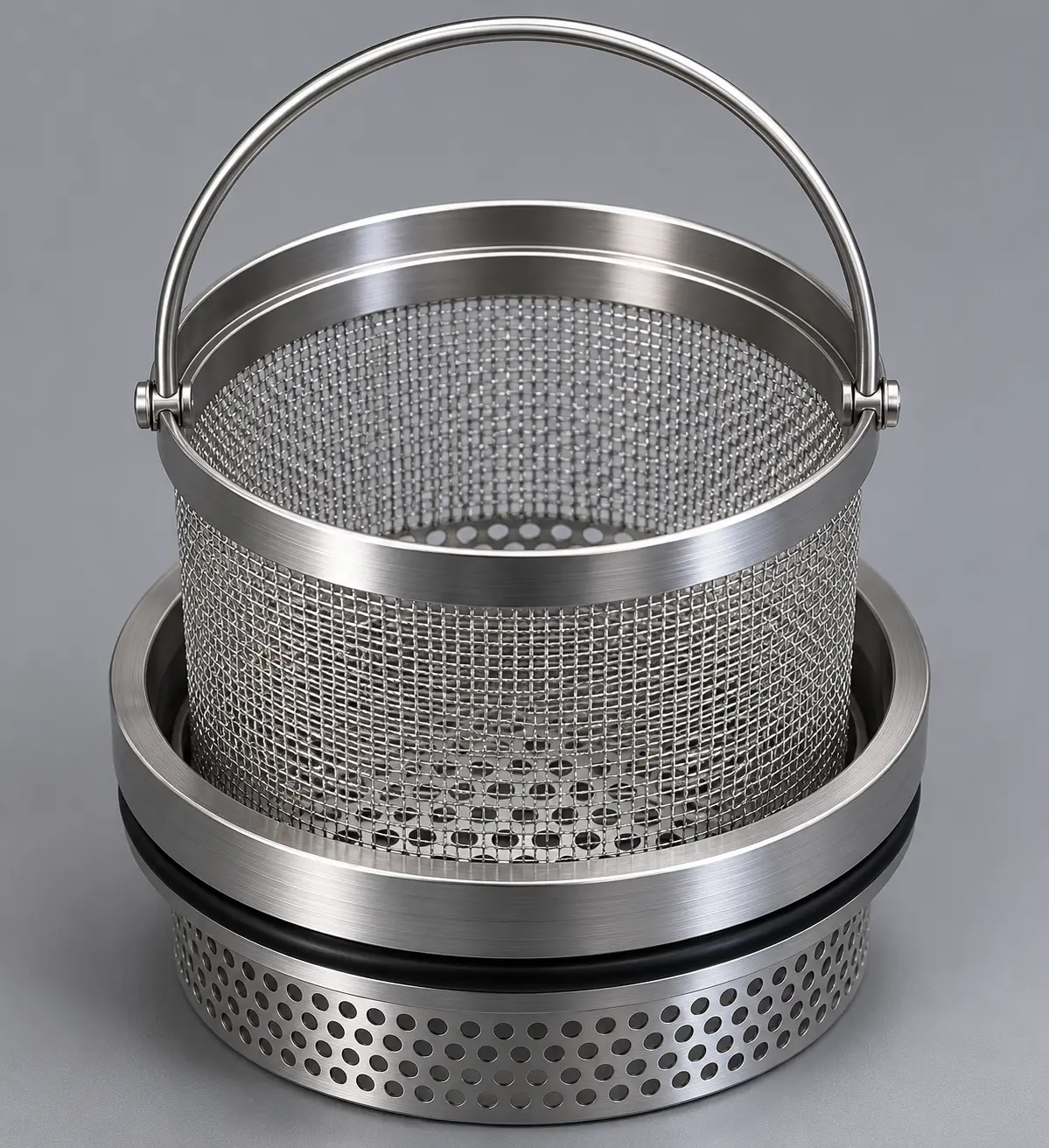 Perforated basket with quick release handle and removable wire mesh liner basket